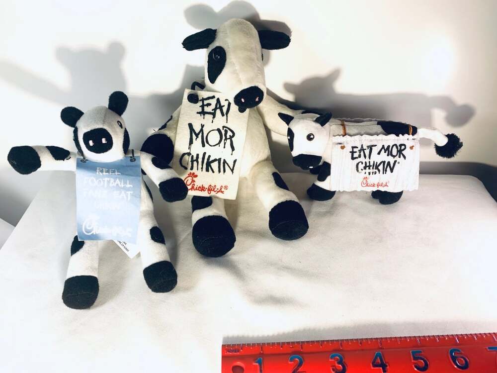 Three Chick-fil-A Cows plush promos